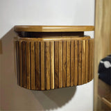Wood Ceylon modern floating nightstand with drawer made of natural wood slats mounted on wall
